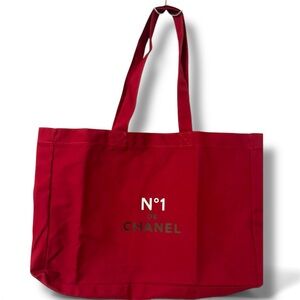CHANEL Travel/Shopping Tote Red Canvas. Brand new in packaging.